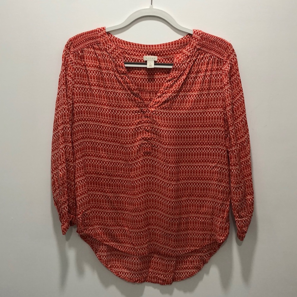 Coral and white patterned blouse from Nordstrom